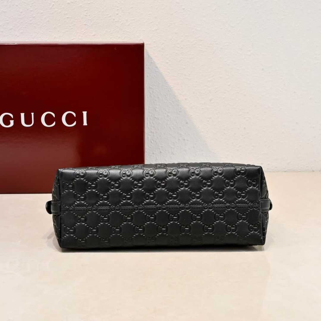 Gucci – Bolso bandolera mediano con el emblema GG