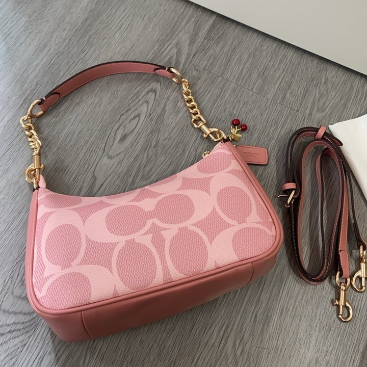 Coach Teri - Bolso bandolera en lona rosa exclusiva